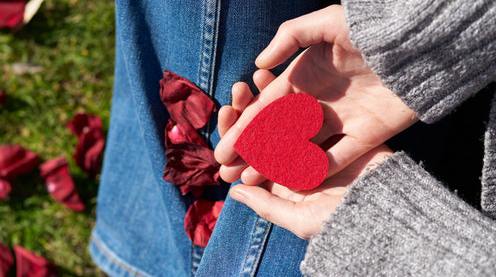 person-holding-heart-shaped-cut-out-1820525.jpg